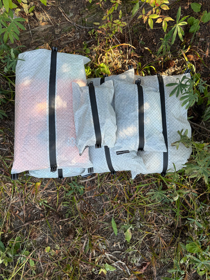 Folded camping mattress on grass